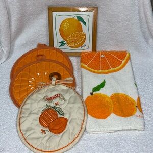 Vintage orange themed kitchen decor trivet, pot holders, towel